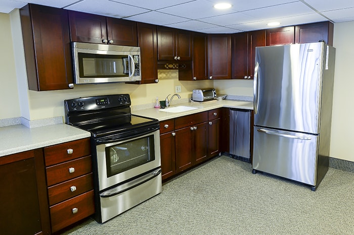Fairfax Community Kitchen - stove oven refrigerator and countertop